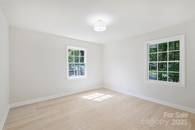 811 Ashmeade Rd, Charlotte, NC 28211 - spare room with light wood-style flooring and baseboards