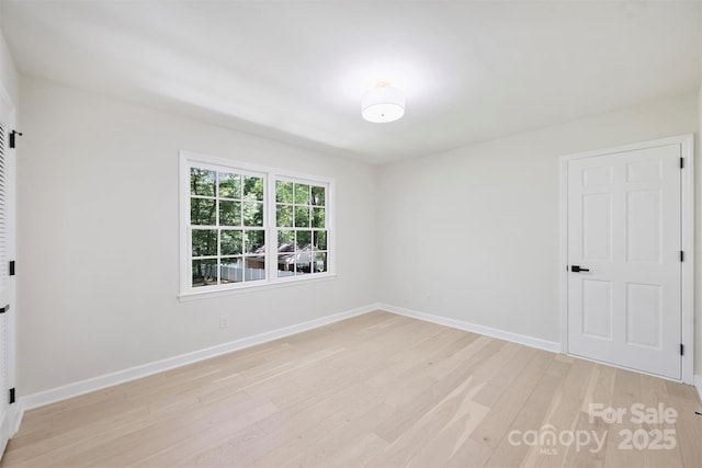 811 Ashmeade Rd, Charlotte, NC 28211 - empty room with light wood-style flooring and baseboards