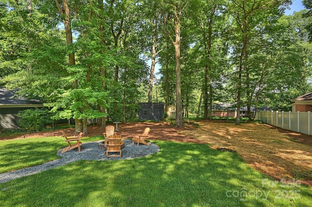 811 Ashmeade Rd, Charlotte, NC 28211 - view of yard featuring a fire pit and a shed