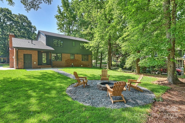 811 Ashmeade Rd, Charlotte, NC 28211 - view of green lawn featuring a fire pit