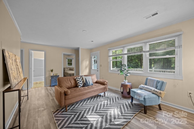790 Thompson Rd, Saluda, NC 28773 - living area with wood finished floors and ornamental molding