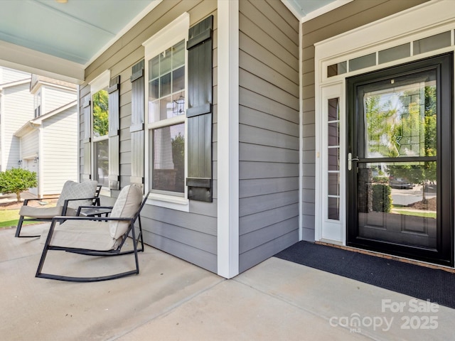 1009 Hampton Grove Rd, Waxhaw, NC 28173 - view of exterior entry featuring a porch