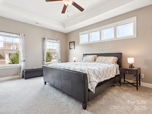 1009 Hampton Grove Rd, Waxhaw, NC 28173 - bedroom featuring light colored carpet, a raised ceiling, crown molding, and a ceiling fan