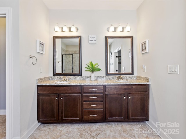 1009 Hampton Grove Rd, Waxhaw, NC 28173 - bathroom featuring double vanity, a stall shower, and tile patterned flooring