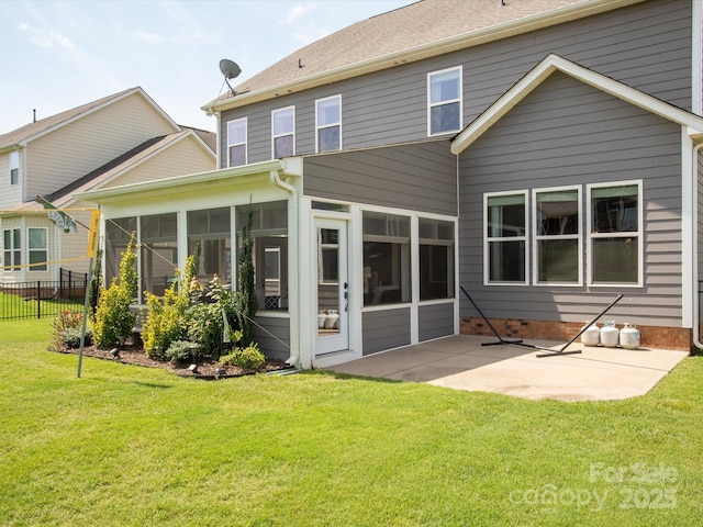 1009 Hampton Grove Rd, Waxhaw, NC 28173 - rear view of house with a sunroom and a patio