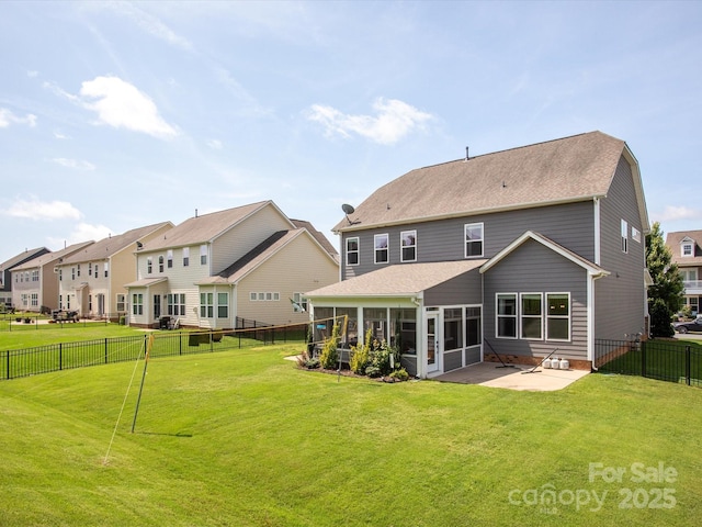 1009 Hampton Grove Rd, Waxhaw, NC 28173 - rear view of property featuring a sunroom, a patio area, a fenced backyard, and a residential view