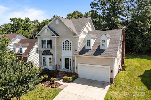 4519 Rock Stream Dr, Charlotte, NC 28269 - traditional home featuring concrete driveway, a front lawn, a shingled roof, a chimney, and an attached garage