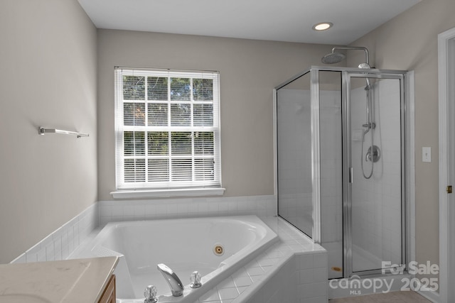 4519 Rock Stream Dr, Charlotte, NC 28269 - full bath with a stall shower, a tub with jets, and vanity
