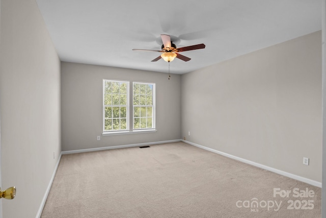 4519 Rock Stream Dr, Charlotte, NC 28269 - carpeted empty room featuring a ceiling fan and baseboards