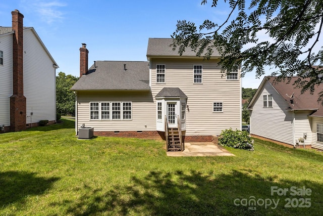4519 Rock Stream Dr, Charlotte, NC 28269 - rear view of house featuring entry steps, crawl space, a shingled roof, a lawn, and a chimney