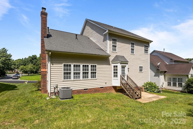 4519 Rock Stream Dr, Charlotte, NC 28269 - rear view of house with a chimney, crawl space, a yard, and roof with shingles