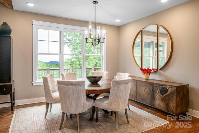 807 Hollybrook Dr, Flat Rock, NC 28731 - dining room with healthy amount of natural light, a chandelier, wood finished floors, and recessed lighting