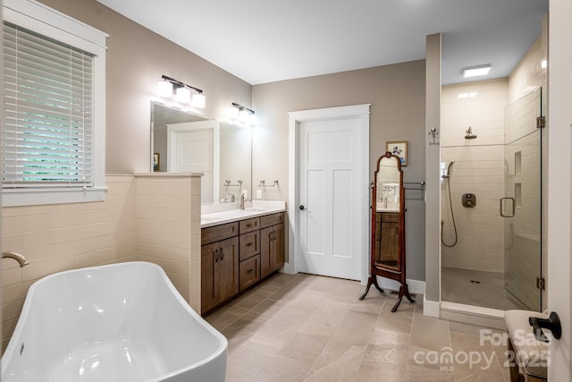 807 Hollybrook Dr, Flat Rock, NC 28731 - bathroom with a soaking tub, a shower stall, and vanity