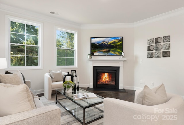 130 S Shayna Rd, Troutman, NC 28166 - living area featuring wood finished floors, a fireplace with flush hearth, and crown molding