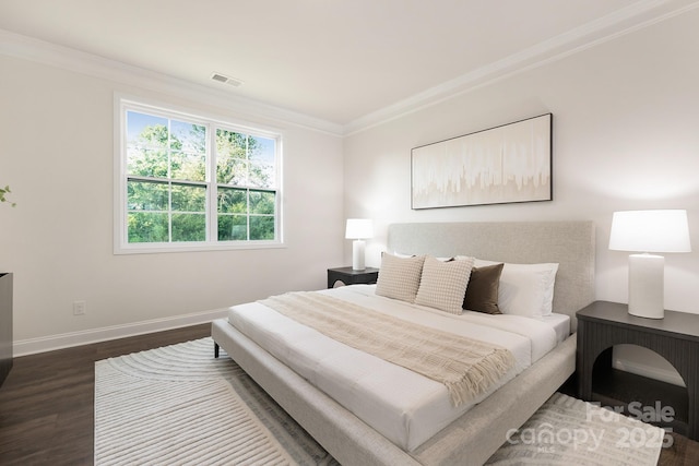 130 S Shayna Rd, Troutman, NC 28166 - bedroom featuring dark wood finished floors and crown molding