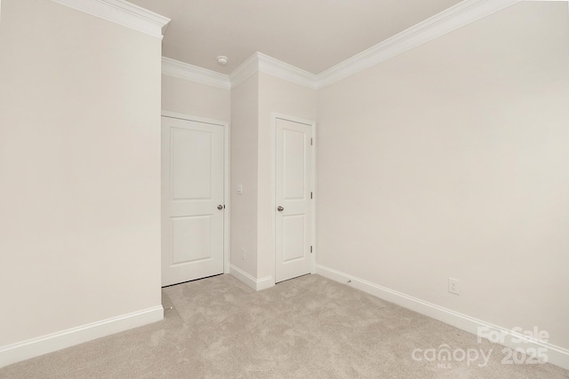 130 S Shayna Rd, Troutman, NC 28166 - unfurnished bedroom featuring ornamental molding and light colored carpet