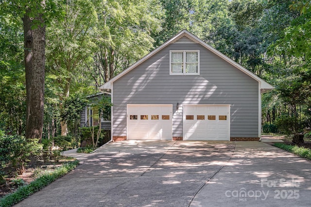 140 Rustic Way Ln, Mooresville, NC 28117 - view of side of home with a garage and concrete driveway