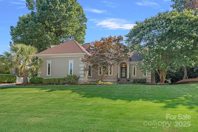 15724 Eagleview Dr, Charlotte, NC 28278 - view of property hidden behind natural elements featuring stucco siding and a front yard