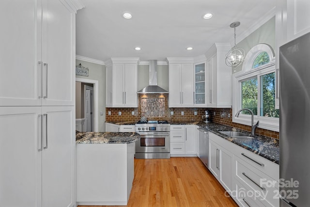 15724 Eagleview Dr, Charlotte, NC 28278 - kitchen featuring stainless steel appliances, wall chimney exhaust hood, white cabinetry, glass insert cabinets, and ornamental molding