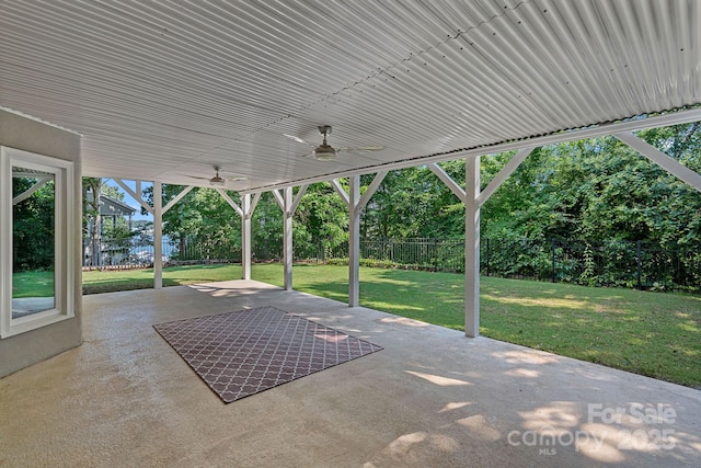 15724 Eagleview Dr, Charlotte, NC 28278 - fenced backyard with ceiling fan and a patio area