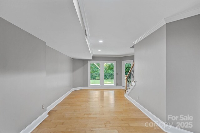 15724 Eagleview Dr, Charlotte, NC 28278 - corridor with crown molding, light wood finished floors, stairway, and recessed lighting