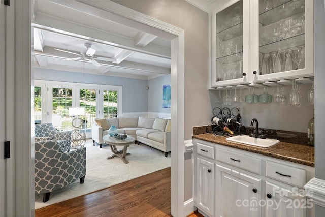 2317 Houston Branch Rd, Charlotte, NC 28270 - indoor wet bar featuring dark wood-style flooring, a ceiling fan, coffered ceiling, and beamed ceiling