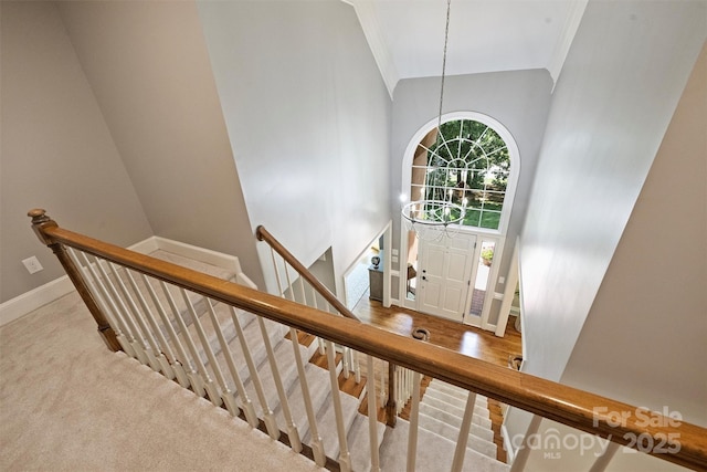 2317 Houston Branch Rd, Charlotte, NC 28270 - stairs with a towering ceiling and crown molding