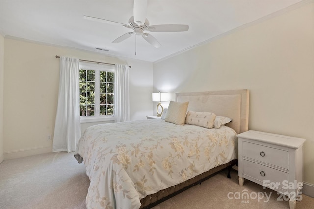 2317 Houston Branch Rd, Charlotte, NC 28270 - carpeted bedroom featuring ornamental molding and a ceiling fan