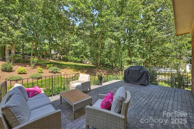 2317 Houston Branch Rd, Charlotte, NC 28270 - view of patio / terrace with an outdoor hangout area, area for grilling, view of wooded area, and a wooden deck