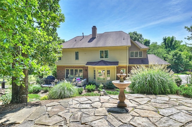 2317 Houston Branch Rd, Charlotte, NC 28270 - back of house featuring a trampoline, a patio, and brick siding