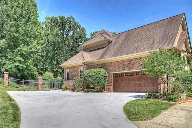2317 Houston Branch Rd, Charlotte, NC 28270 - view of front of property featuring driveway, brick siding, a garage, and a shingled roof