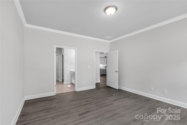 10180 Lakeshore Dr, Lancaster, SC 29720 - unfurnished bedroom featuring crown molding, dark wood-style flooring, and ensuite bathroom