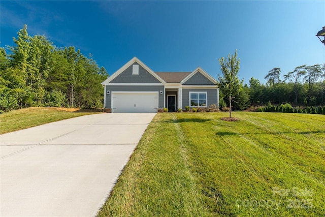 10180 Lakeshore Dr, Lancaster, SC 29720 - view of front of property featuring an attached garage, a front lawn, and driveway