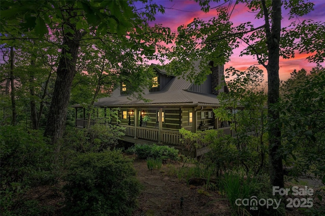 35 Elderberry Dr Unit 805, Old Fort, NC 28762 - back of property at dusk featuring a porch