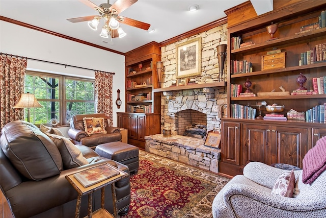 35 Elderberry Dr Unit 805, Old Fort, NC 28762 - living area featuring crown molding, ceiling fan, a stone fireplace, wood finished floors, and built in features