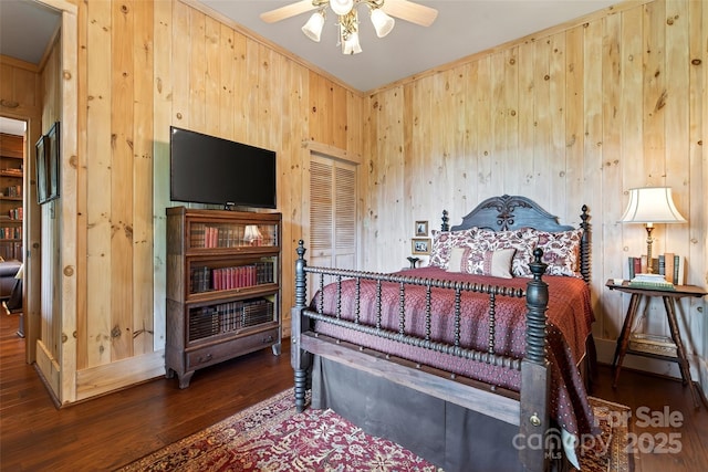 35 Elderberry Dr Unit 805, Old Fort, NC 28762 - bedroom with wood walls, wood finished floors, and a ceiling fan