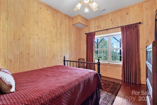 35 Elderberry Dr Unit 805, Old Fort, NC 28762 - bedroom with wood walls, wood finished floors, and ceiling fan