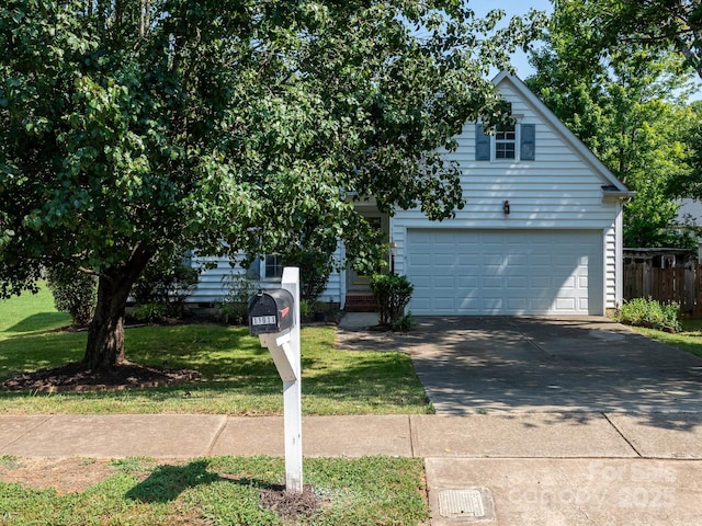 11911 Brownestone View Dr, Charlotte, NC 28269 - obstructed view of property featuring concrete driveway and a garage