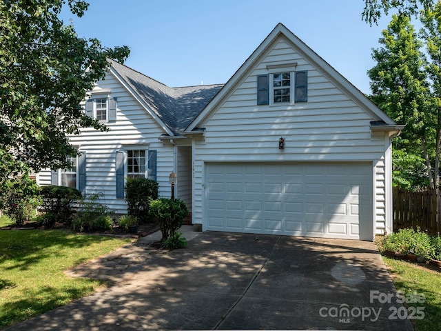 11911 Brownestone View Dr, Charlotte, NC 28269 - traditional-style house with driveway and a shingled roof