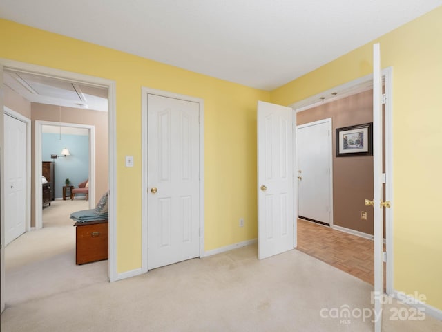 11911 Brownestone View Dr, Charlotte, NC 28269 - unfurnished bedroom featuring attic access and carpet floors