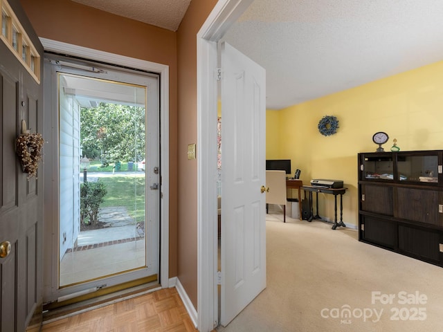 11911 Brownestone View Dr, Charlotte, NC 28269 - entryway featuring an office area and a textured ceiling