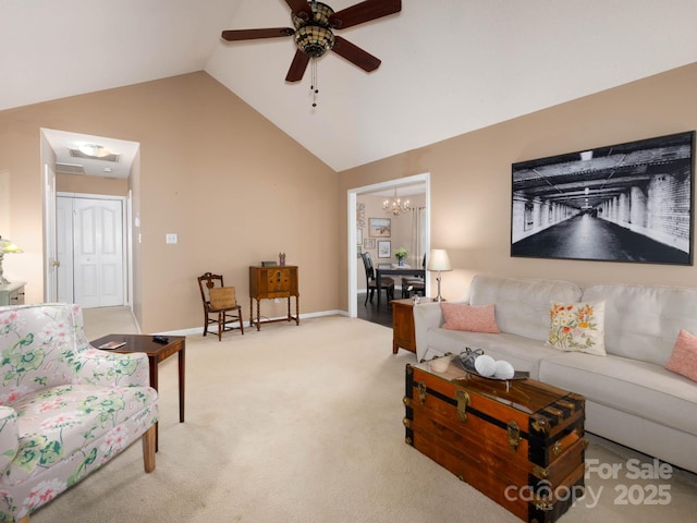 11911 Brownestone View Dr, Charlotte, NC 28269 - carpeted living area featuring a ceiling fan, high vaulted ceiling, and a chandelier