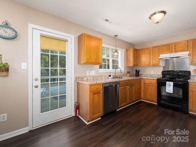 11911 Brownestone View Dr, Charlotte, NC 28269 - kitchen with stainless steel dishwasher, black electric range, under cabinet range hood, dark wood-style floors, and plenty of natural light