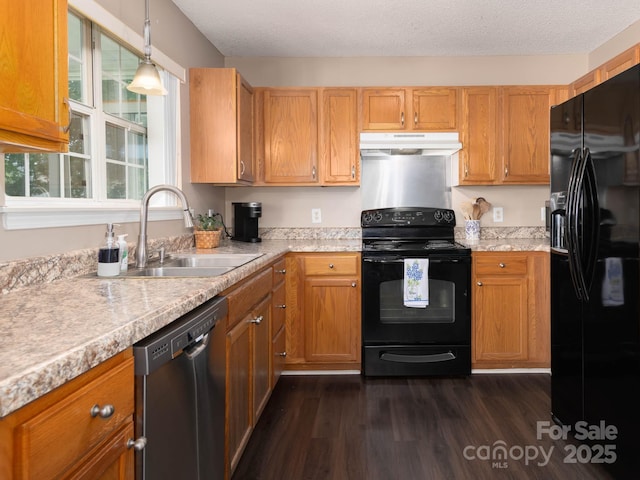 11911 Brownestone View Dr, Charlotte, NC 28269 - kitchen with black appliances, under cabinet range hood, light countertops, and dark wood finished floors