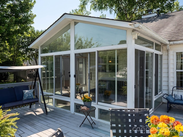 11911 Brownestone View Dr, Charlotte, NC 28269 - deck featuring a sunroom and outdoor lounge area