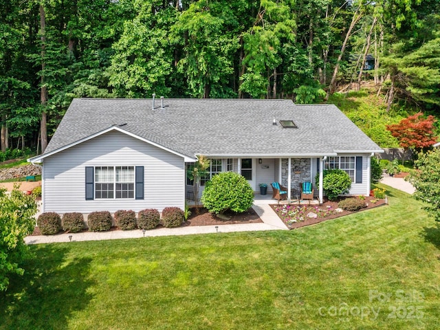 670 New Village Dr, Hendersonville, NC 28791 - view of front facade featuring roof with shingles and a front lawn