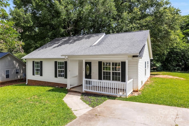 429 Merry Go Dr, York, SC 29745 - view of front of property featuring a porch, a shingled roof, and a front yard