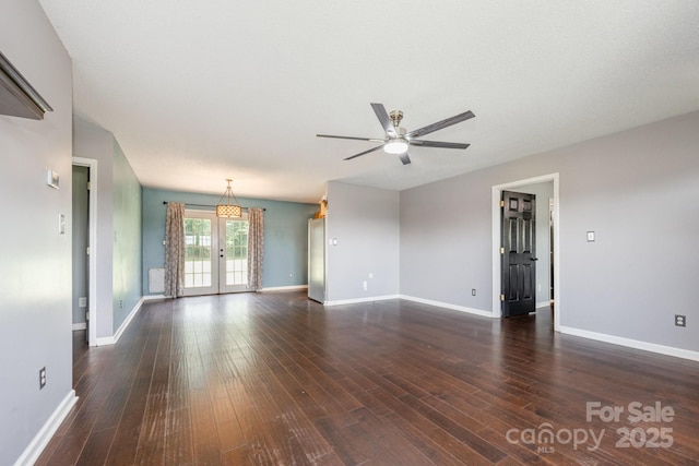 2070 Rocketts Way, Newton, NC 28658 - unfurnished living room with ceiling fan, dark wood-type flooring, and french doors