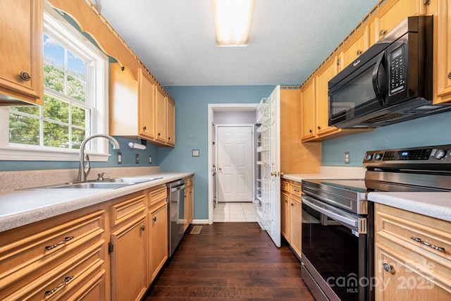 2070 Rocketts Way, Newton, NC 28658 - kitchen with stainless steel appliances, light countertops, and dark wood-type flooring