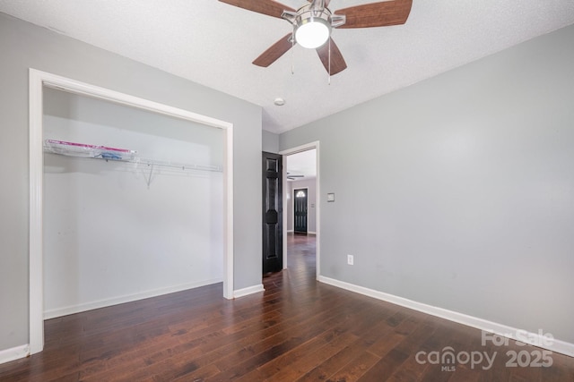 2070 Rocketts Way, Newton, NC 28658 - unfurnished bedroom with hardwood / wood-style floors, a closet, and a ceiling fan